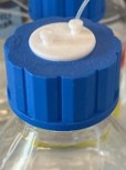 Solvent bottle with a ported (no thread) cap